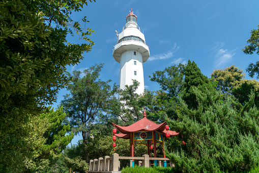 The white lighthouse on the mountaintop