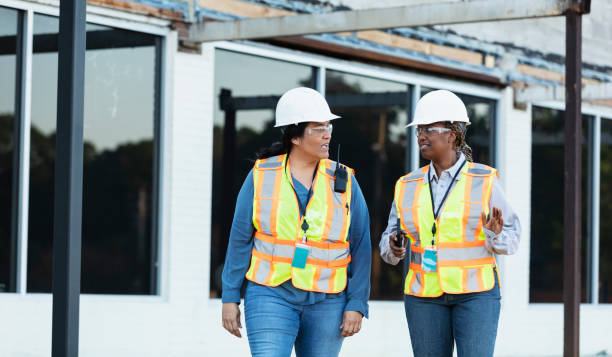 istock Two multiracial female construction workers at job site 1722485526