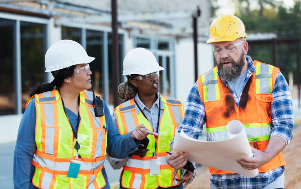 istock Diverse team of three construction workers at job site 1722485986