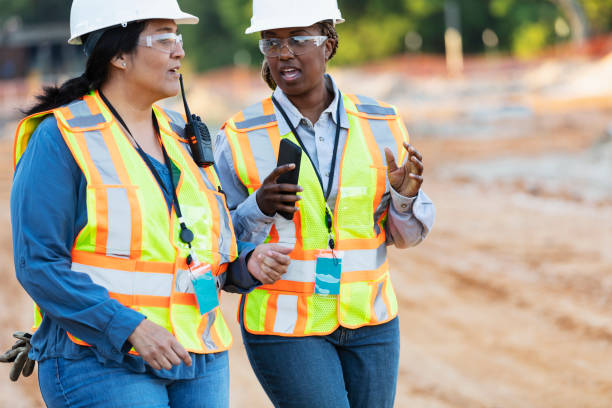 istock Two multiracial female construction workers at job site 1722485987