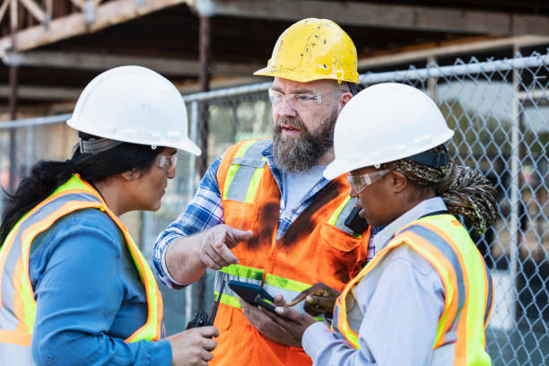 istock Multiracial group of workers meeting at construction site 1722486027