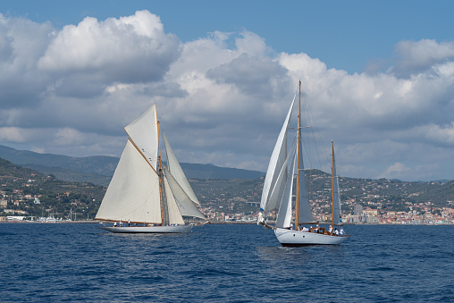 Imperia, Italy - September 7, 2018: Sail yachts the old style, during regatta in Gulf of Imperia. Established in 1986, the Imperia Vintage Yacht Challenge Stage is a of the most important event in sailing the Mediterranean dedicated to historical boats