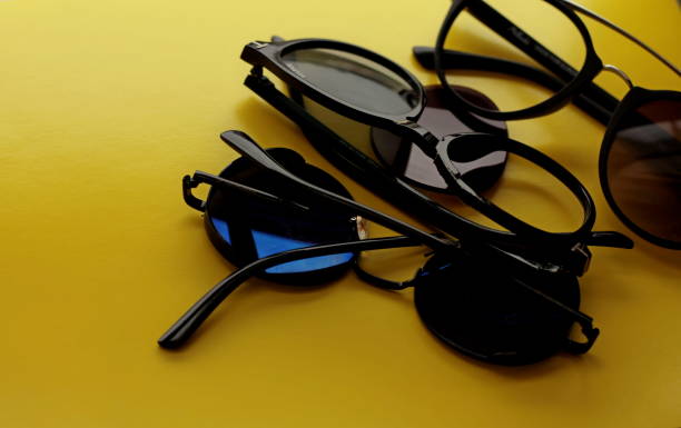 istock broken sunglasses on a yellow background, glasses repair concept 1722489946