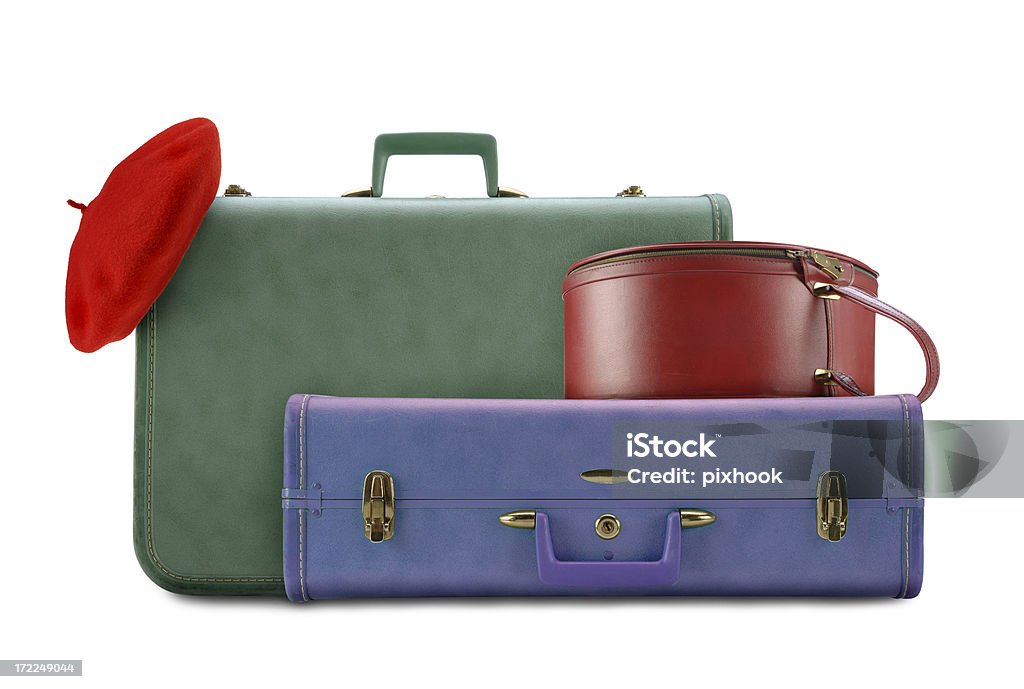 Ready To Go Vintage Luggage with Red Beret on White. Beret Stock Photo