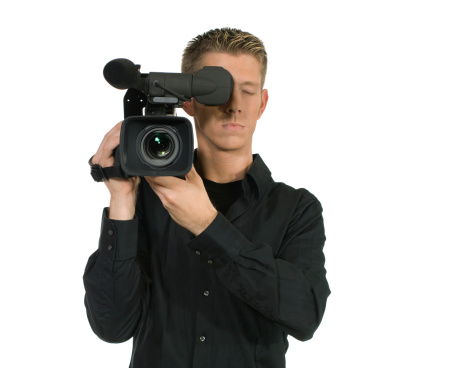 male  holds video camera