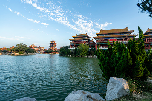 Chinese style garden scenery, ancient architectural attic on the lake