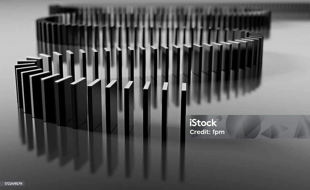 Blank domino pieces set up to fall over in a chain reaction Arranged dominoes Domino Stock Photo