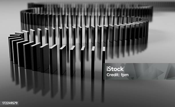 Blank Domino Pieces Set Up To Fall Over In A Chain Reaction Stock Photo - Download Image Now