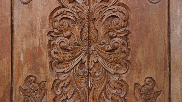 istock carved wooden doors on Javanese houses 1722496469