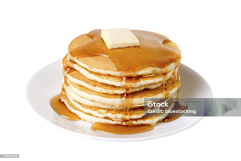 Pancakes A stack of pancakes on a plate with syrup and butter.  Isolated on white with clipping path. Pancake Stock Photo