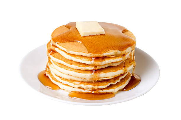 Pancakes A stack of pancakes on a plate with syrup and butter.  Isolated on white with clipping path. pancake photos stock pictures, royalty-free photos & images