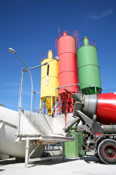 istock Cement mixer in front of three tanks 172250417