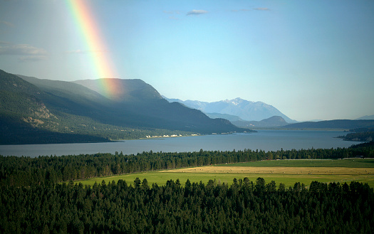 Stunning Rainbow. Columbia Lake East Kootenays British Columbia Canada. Shot from on top of Hoodos Fairmont Hot Springs .