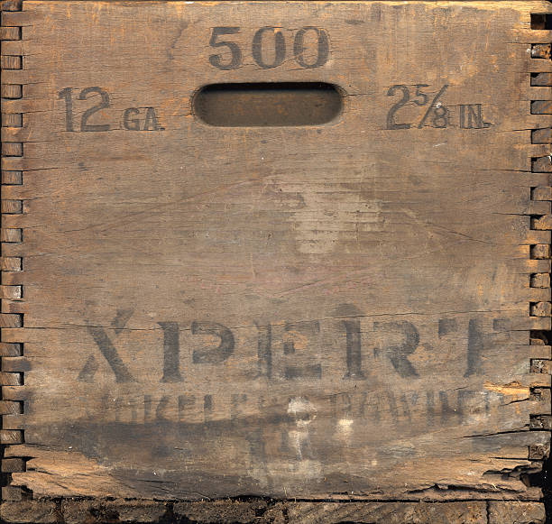 Side of a worn, antique wooden crate.