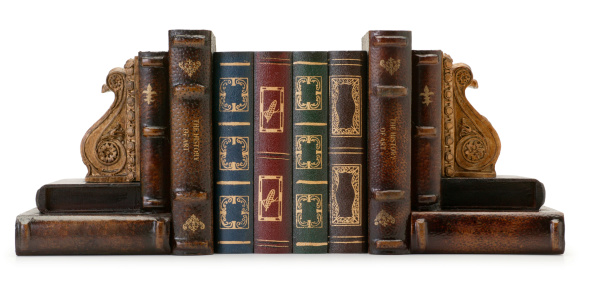 Antique books supported by bookends