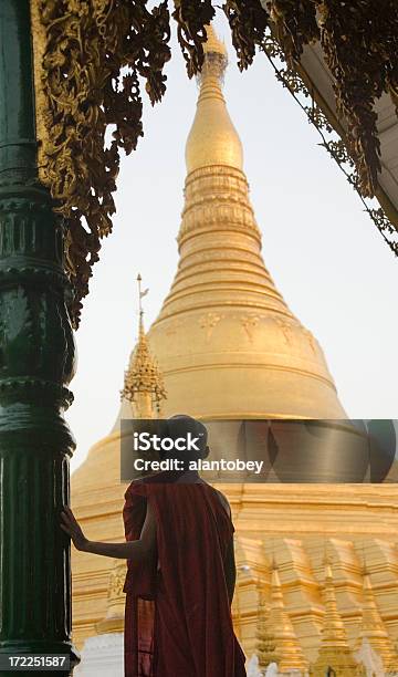 Yangon Myanmar Shwedagon Pagoda And Monk In Evening Light Stock Photo - Download Image Now