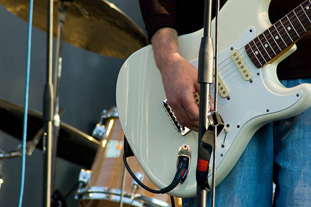 istock guitar and guitarist 172251658