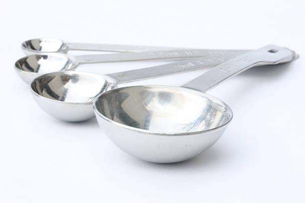 измерение ложки - eating utensil silverware four objects small group of objects стоковые фото и изображения
