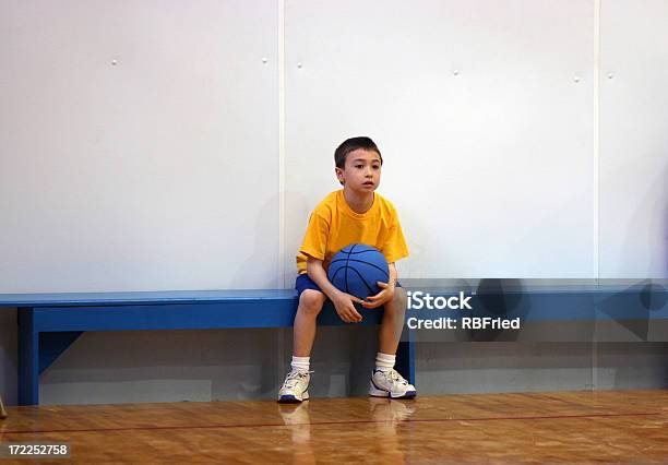 Waiting For The Game Stock Photo - Download Image Now - Boys, Bench, School Gymnasium
