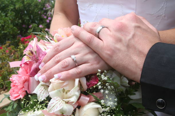 istock Wedding couple holding hands: Bride and groom 172252914