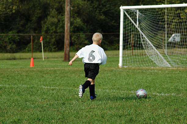 istock Young Soccer Player Races to Goal 172253436