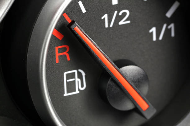 istock fuel gauge in car dashboard - empty 1722534775