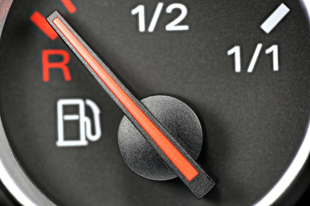 istock fuel gauge in car dashboard - empty 1722536722