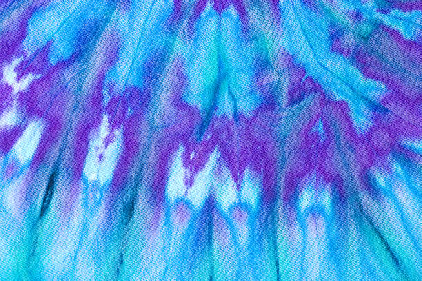 Close-up of blue, teal and purple tie dye detail stock photo