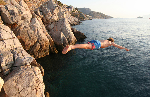 Cliff diver in Greece.