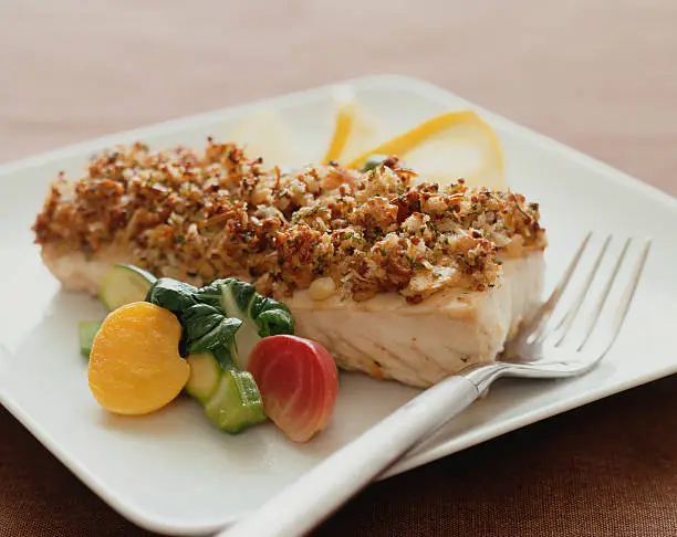 Crumbed fish with veggies.