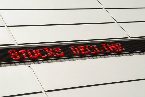 Stocks Decline ticker Ticker showing the words Stocks decline ticker tape machine stock pictures, royalty-free photos & images