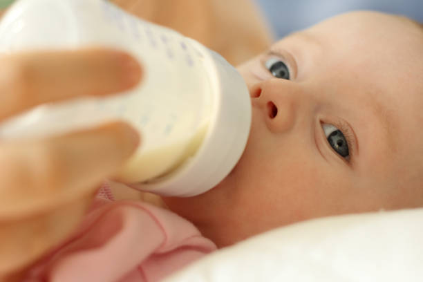 istock Mother feeding newborn baby 172254585