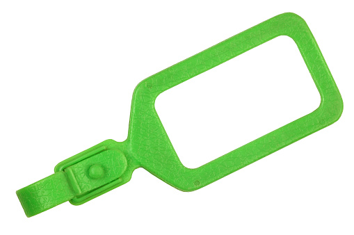 Green luggage tag on white background.