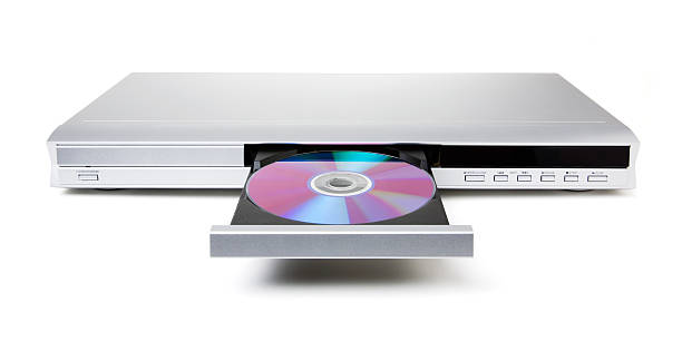 DVD or CD Player with Disc A DVD/CD player with a disc in the tray. Isolated on white with clipping path. dvd player stock pictures, royalty-free photos & images