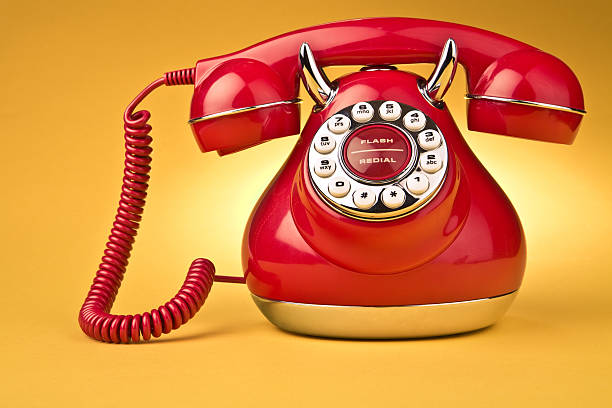 istock Red Vintage Phone on Orange Background 172255930