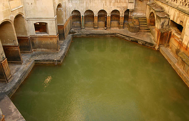 Above view of Roman Bath View from above a Roman Bath in the City of Bath England roman baths stock pictures, royalty-free photos & images