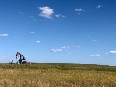 Oil jack pumps dotting the Oklahoma prairie plains