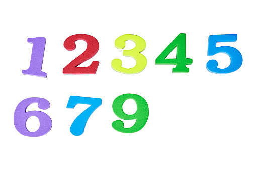Colorful magnetic numbers on white background