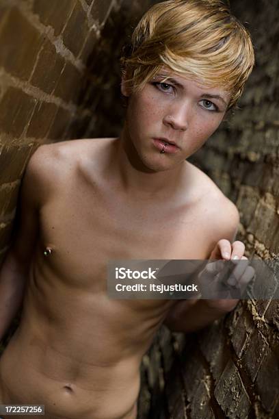 Emerging From The Darkness Stock Photo - Download Image Now - Teenage Boys, Emergence, Dark