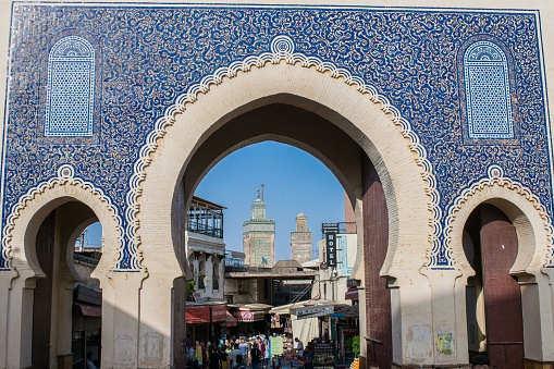 Fez, Morocco – September 03, 2018: Bab Bou Jeloud, the decorated ornate city gate to Fez el Bali, the old town of the city of Fes, Morocco, North Africa, decorated in blue tiles.