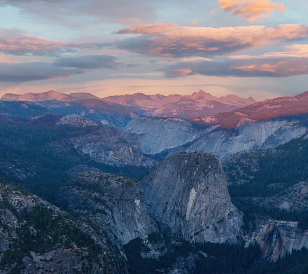 Sunset views from Glacier Point, including: Mount Broderick, Liberty Cap, and Nevada Falls. Yosemite National Park, California, USA.