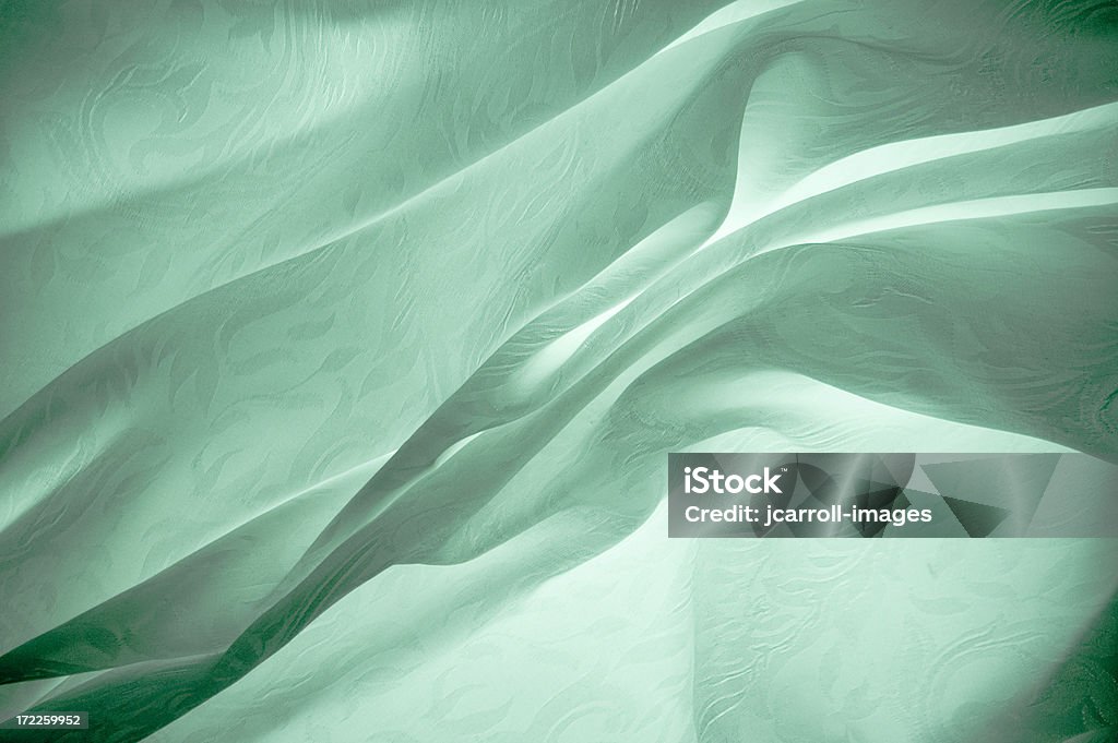 流れるような抽象的な薄緑色の背景 - 布のロイヤリティフリーストックフォト