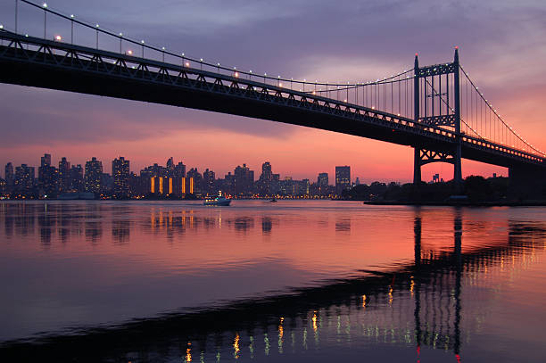 Triboro bridge silhouette at sunset Triboro bridge connecting Queens, Manhattan, and the bronx queens new york city stock pictures, royalty-free photos & images