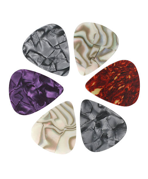 Six different patterned guitar picks stock photo