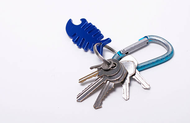 keys, carabiner and bottle opener stock photo