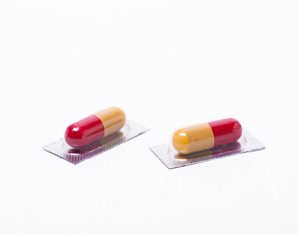 two capsules/ pills stock photo