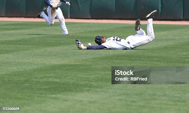 Man Diving And Missing The Catch In Baseball Stock Photo - Download Image Now - Failure, Falling, Baseball - Sport