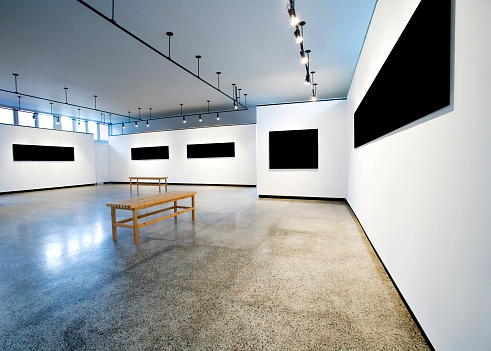 Empty white horizontal canvas on concrete wall in modern art gallery. Mock up interior in contemporary style. Free, copy space for your picture. Exhibition space. 3D rendering