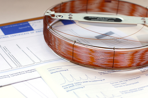 capillary columns of various lengths for gas chromatographic analysis and chromatogram samples. equipment for analytical chemistry in the laboratory. close-up, selective focus