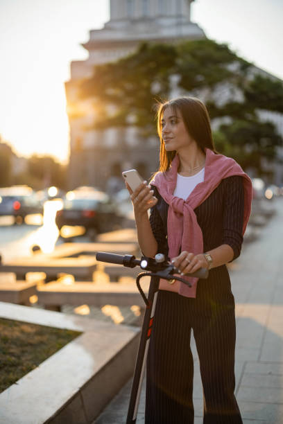 istock Woman with e-scooter in the city 1722616896